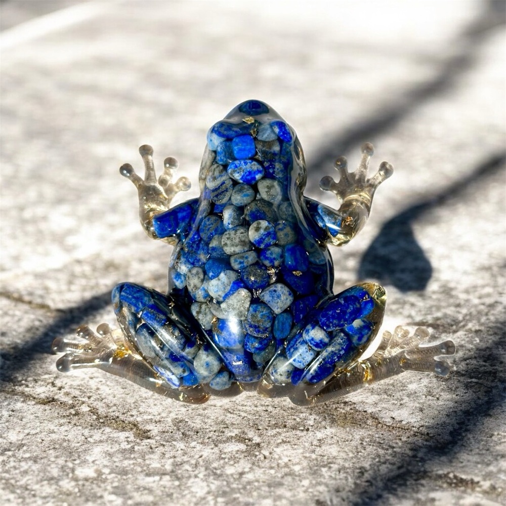 Resin frog paperweight collectible filled with lapis? Or sodalite stones cool